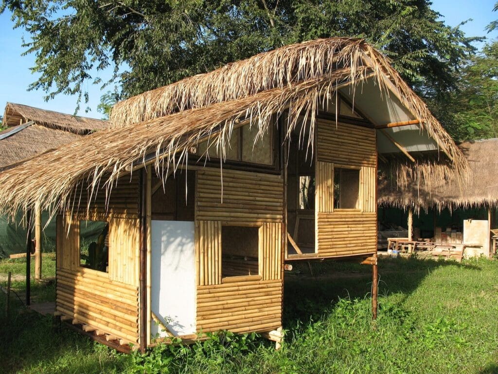 small hut built from bamboo with thatch roof
