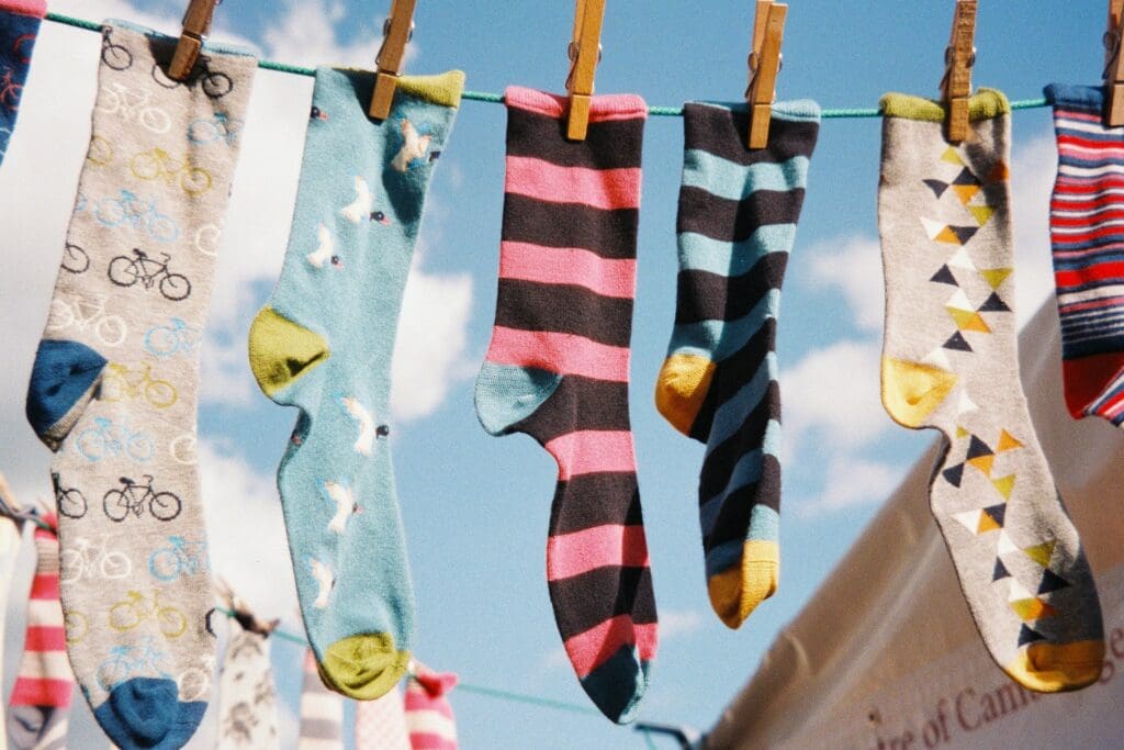 socks on washing line, various colours and styles